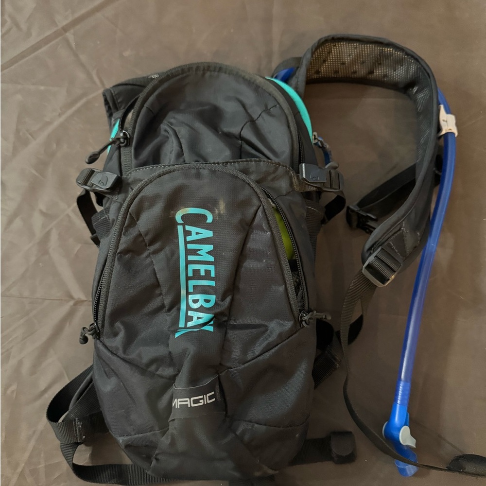 CamelBak Black Backpack with Teal Logo and Blue Hydration Tube
